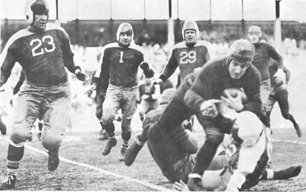 The 1934 NFL Championship, known as the “Sneakers Game,” was played on an icy field at the Polo Grounds. Players swapped their cleats for sneakers to get better traction, showcasing how rudimentary field conditions were back then.